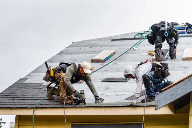 Professional Gutter Installation technician working in Islip Terrace, NY